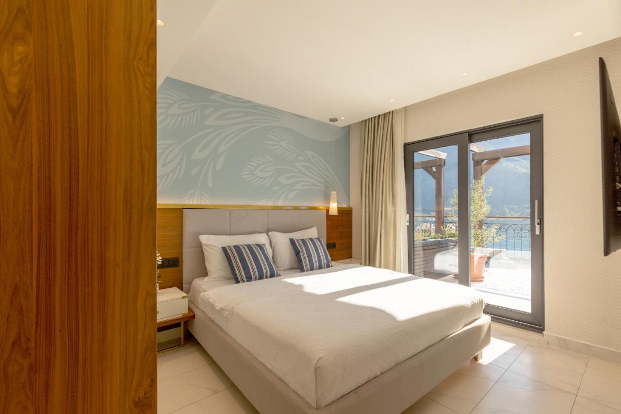Huma Kotor Bay Hotel And Villas Eksteriør bilde A bedroom at the hotel